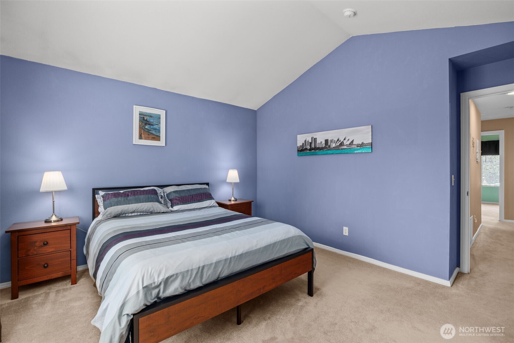 5021 South 232nd Street, Unit 75 Kent, WA 98032 - Photo 19 of 40 a bedroom with a bed and a lamp on dresser