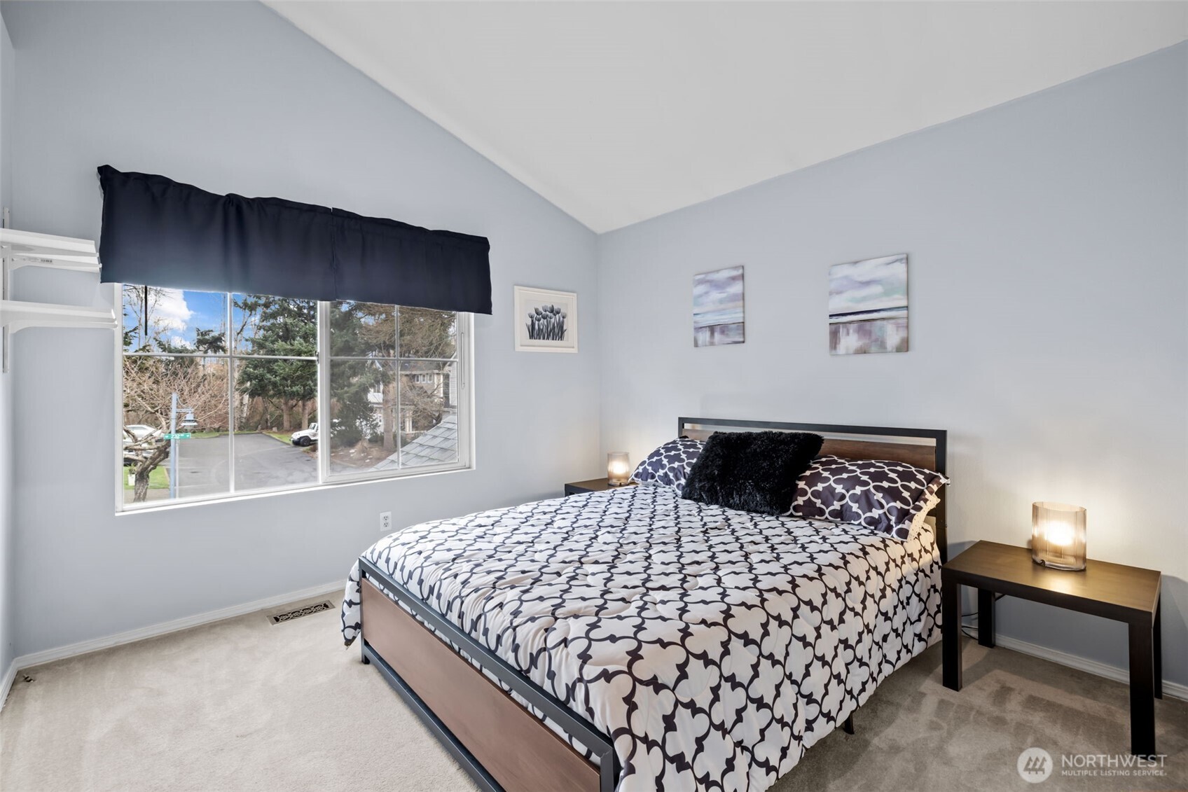 5021 South 232nd Street, Unit 75 Kent, WA 98032 - Photo 25 of 40 a bedroom with a bed and window