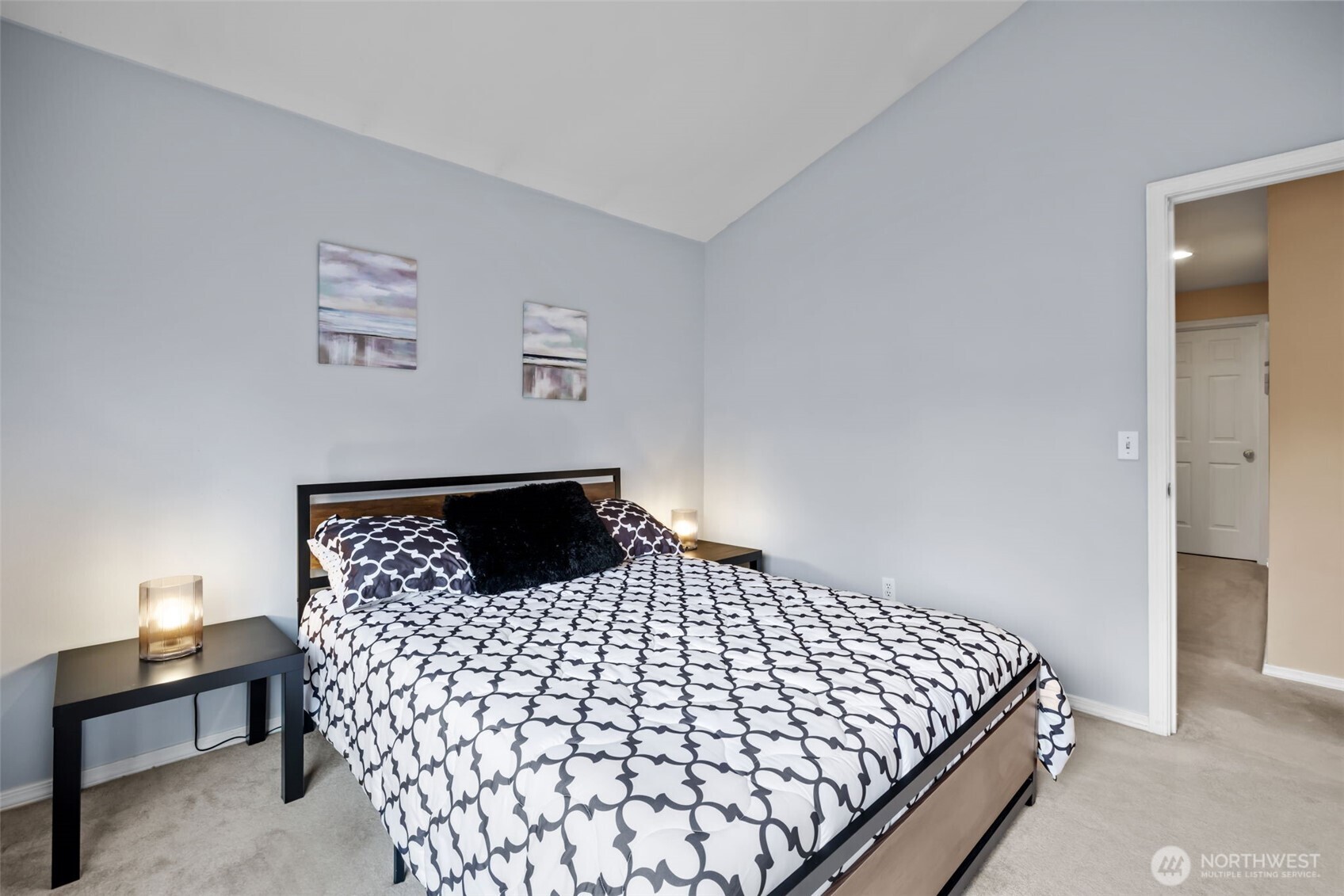 5021 South 232nd Street, Unit 75 Kent, WA 98032 - Photo 26 of 40 a bedroom with a bed and window