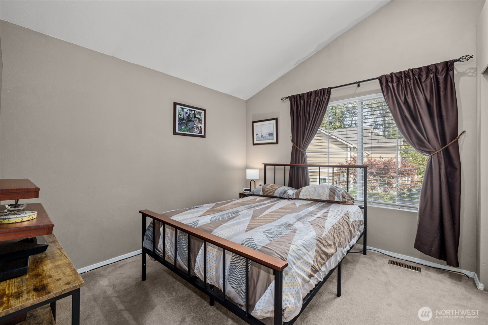 5021 South 232nd Street, Unit 75 Kent, WA 98032 - Photo 27 of 40 a bedroom with a bed and a window