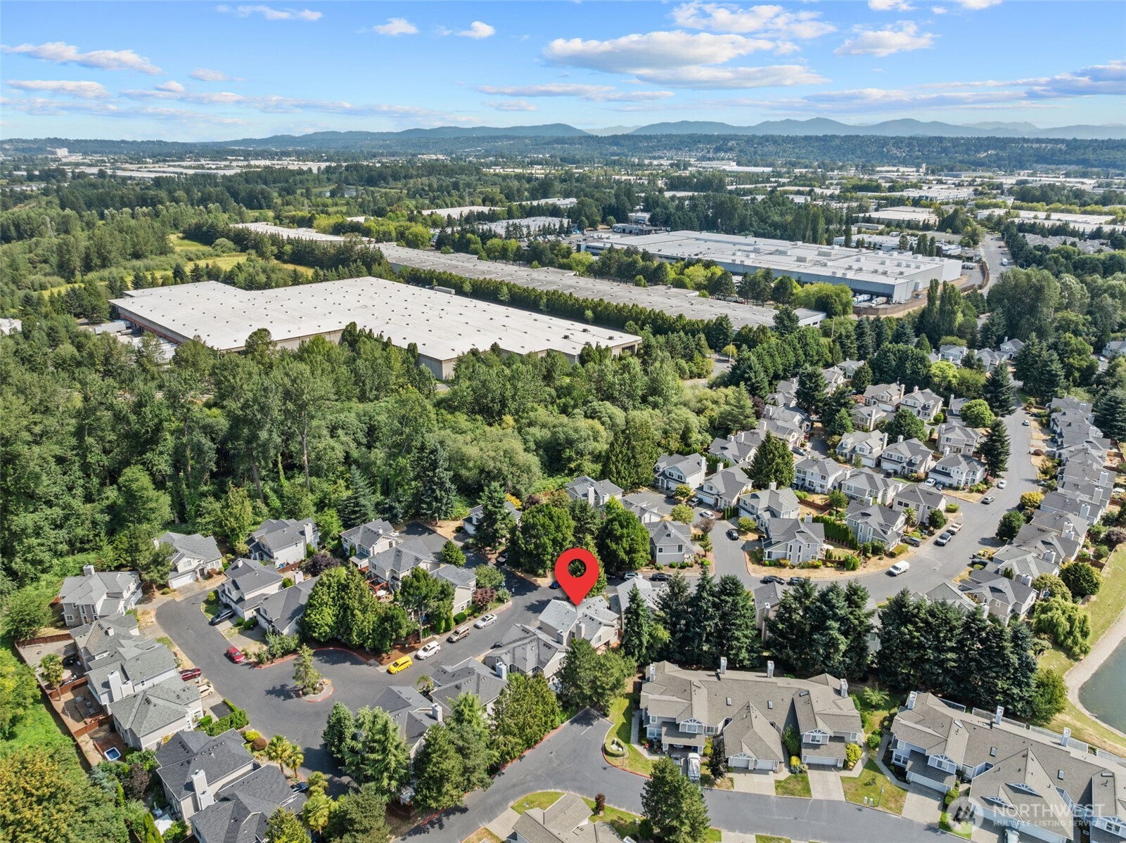 5021 South 232nd Street, Unit 75 Kent, WA 98032 - Photo 40 of 40 an aerial view of a city with lots of residential buildings
