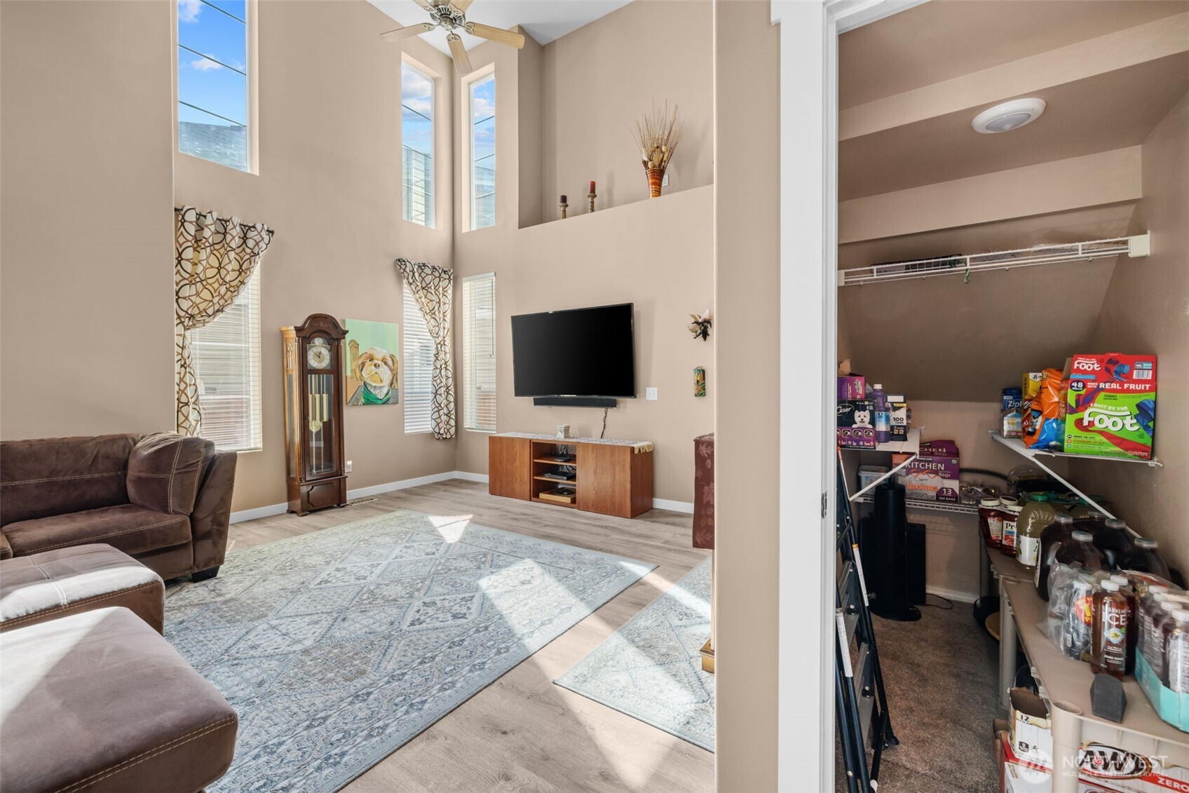 5021 South 232nd Street, Unit 75 Kent, WA 98032 - Photo 5 of 40 a view of a livingroom with furniture and a flat screen tv