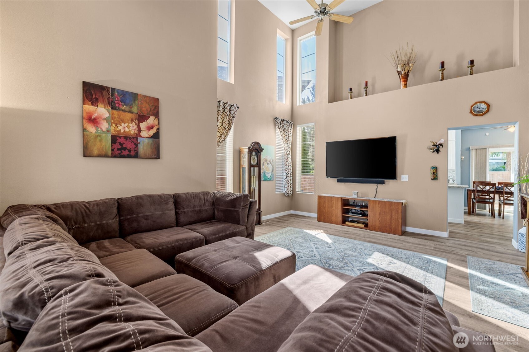5021 South 232nd Street, Unit 75 Kent, WA 98032 - Photo 6 of 40 a living room with furniture and a flat screen tv