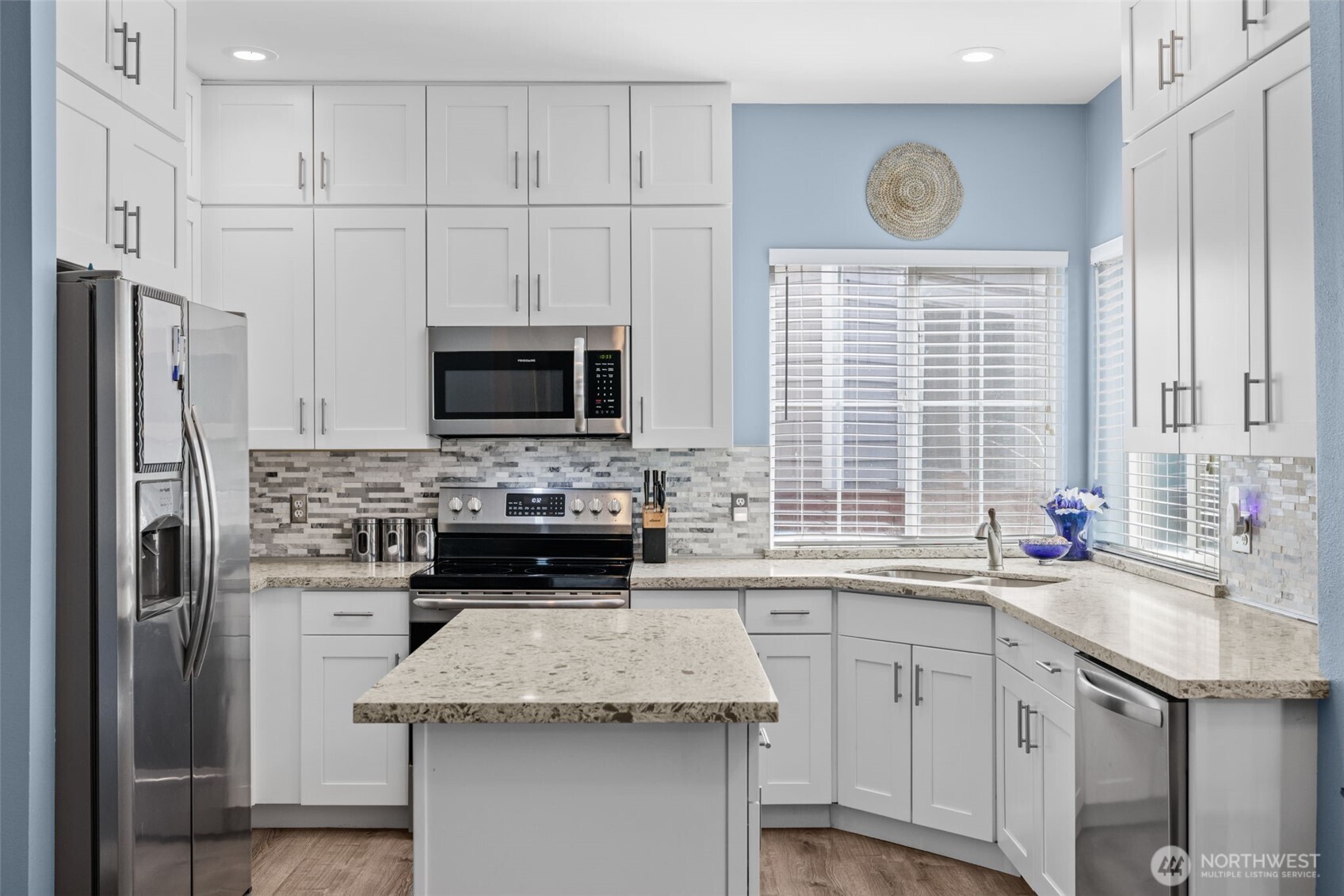 5021 South 232nd Street, Unit 75 Kent, WA 98032 - Photo 10 of 40 a kitchen with a sink stove and refrigerator