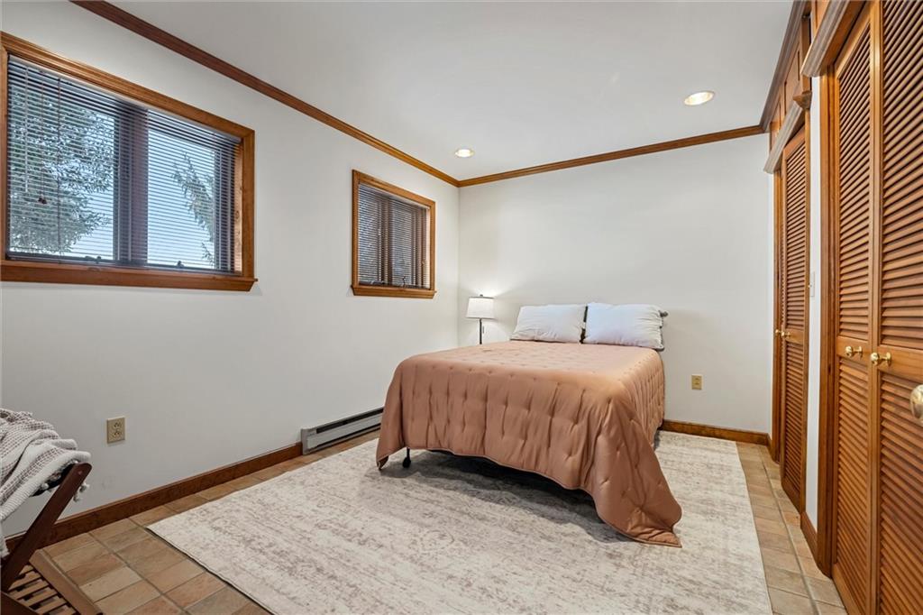 121 Brewer Road Saxonburg, PA 16056 - Photo 30 of 50 a spacious bedroom with a bed and a window