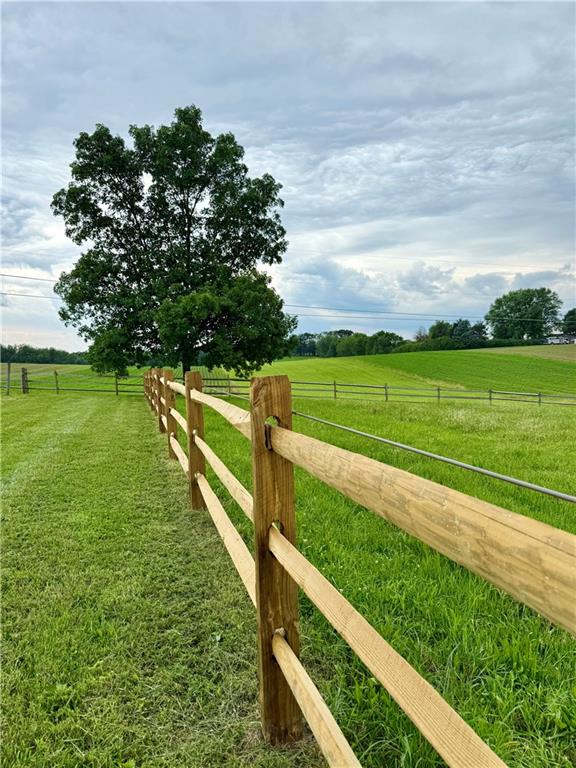 121 Brewer Road Saxonburg, PA 16056 - Photo 6 of 50 a view of a golf course with a lake