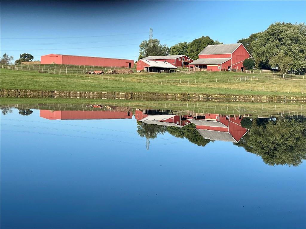 121 Brewer Road Saxonburg, PA 16056 - Photo 8 of 50 a view of a lake with a big yard