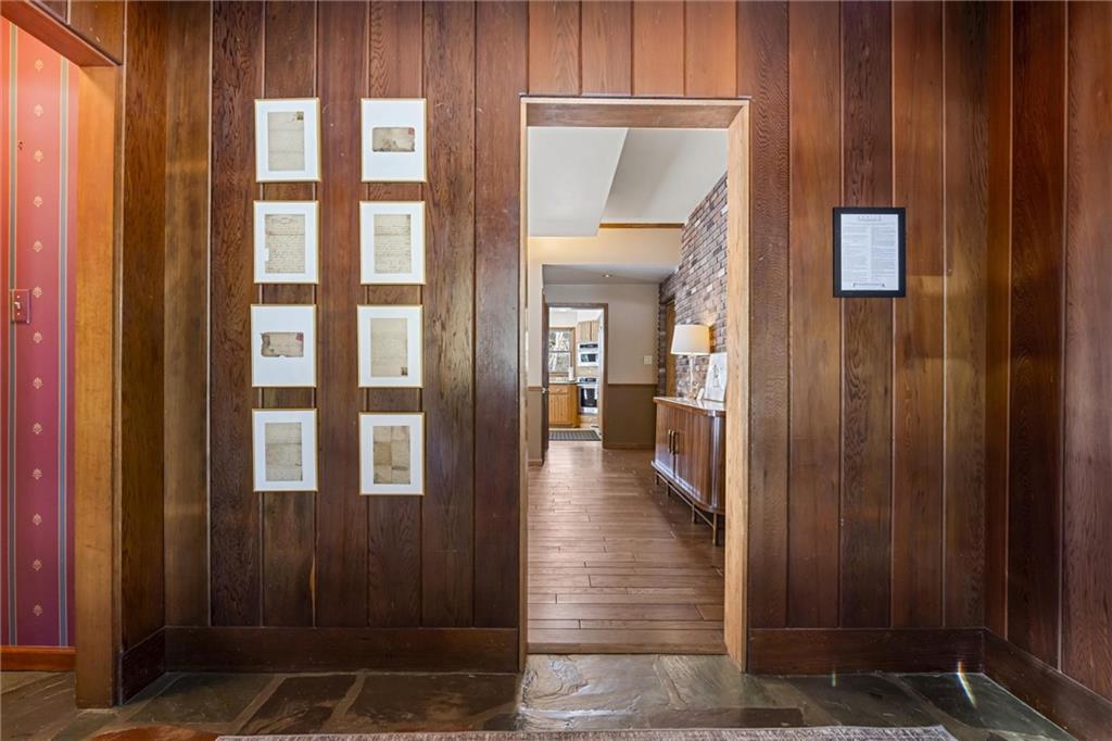 121 Brewer Road Saxonburg, PA 16056 - Photo 10 of 50 a view of a hallway with wooden floor and staircase