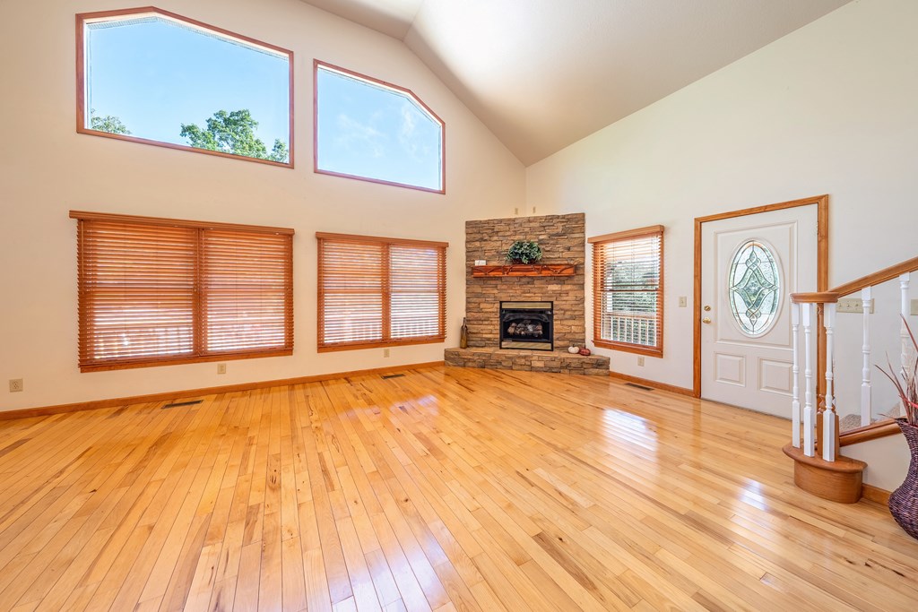 314 Ruby Ridge Young Harris, GA 30582 - Photo 11 of 39 a view of an empty room with window and wooden floor