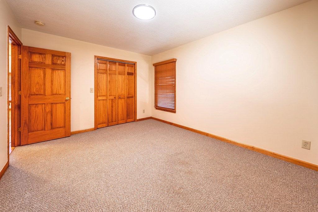 314 Ruby Ridge Young Harris, GA 30582 - Photo 18 of 39 an empty room with windows
