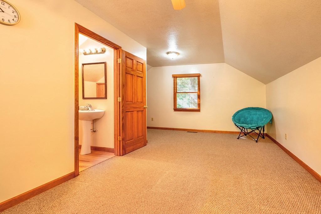 314 Ruby Ridge Young Harris, GA 30582 - Photo 21 of 39 a view of a livingroom with a table and a chair