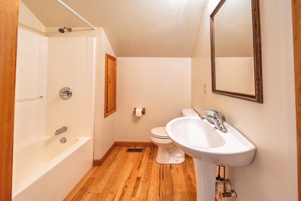314 Ruby Ridge Young Harris, GA 30582 - Photo 23 of 39 a bathroom with a sink and a mirror