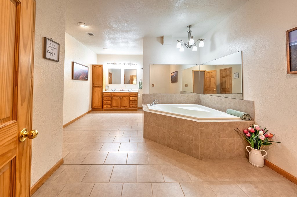 314 Ruby Ridge Young Harris, GA 30582 - Photo 26 of 39 a spacious bathroom with a tub shower and sink
