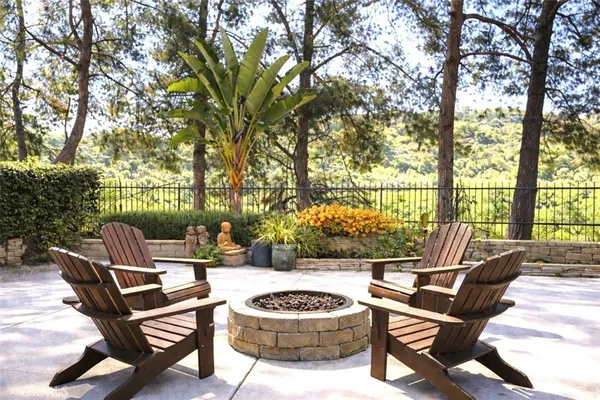 a view of a patio with a backyard