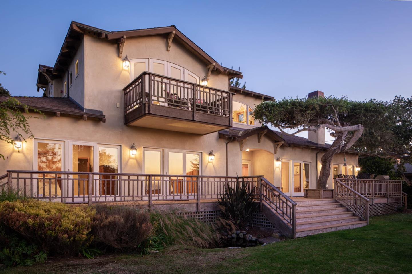 2876 Oak Knoll Road Pebble Beach, CA 93953 - Photo 3 of 14 a view of a house with brick walls and a small yard
