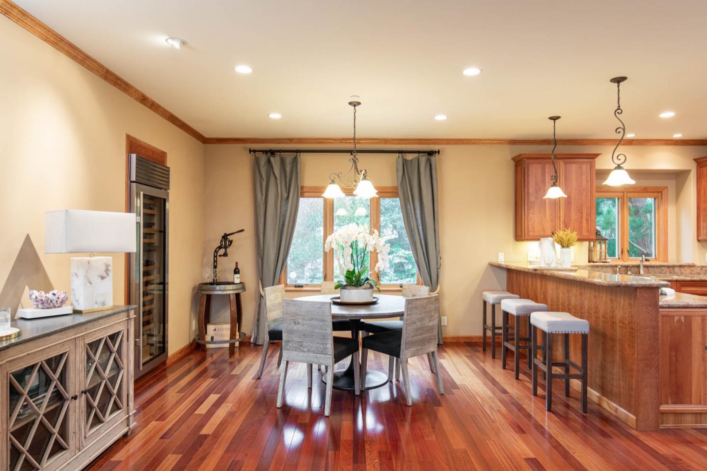 2876 Oak Knoll Road Pebble Beach, CA 93953 - Photo 7 of 14 a view of a a dining room with furniture window and wooden floor