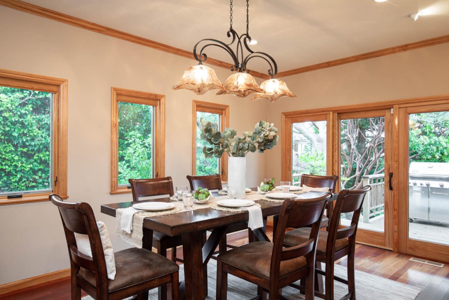 2876 Oak Knoll Road Pebble Beach, CA 93953 - Photo 8 of 14 a view of a dining room with furniture window and outside view