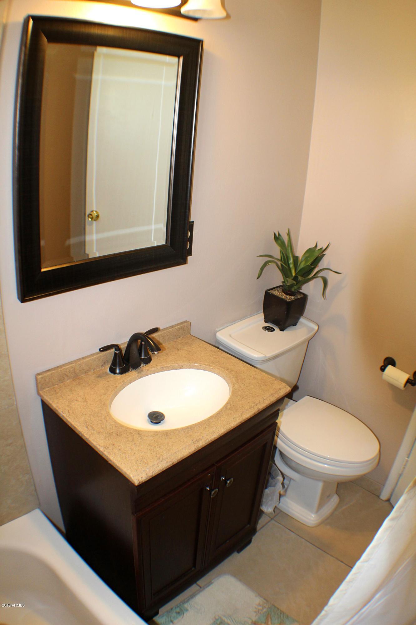 3938 West Royal Palm Road Phoenix, AZ 85051 - Photo 12 of 19 Hallway Bathroom View 2