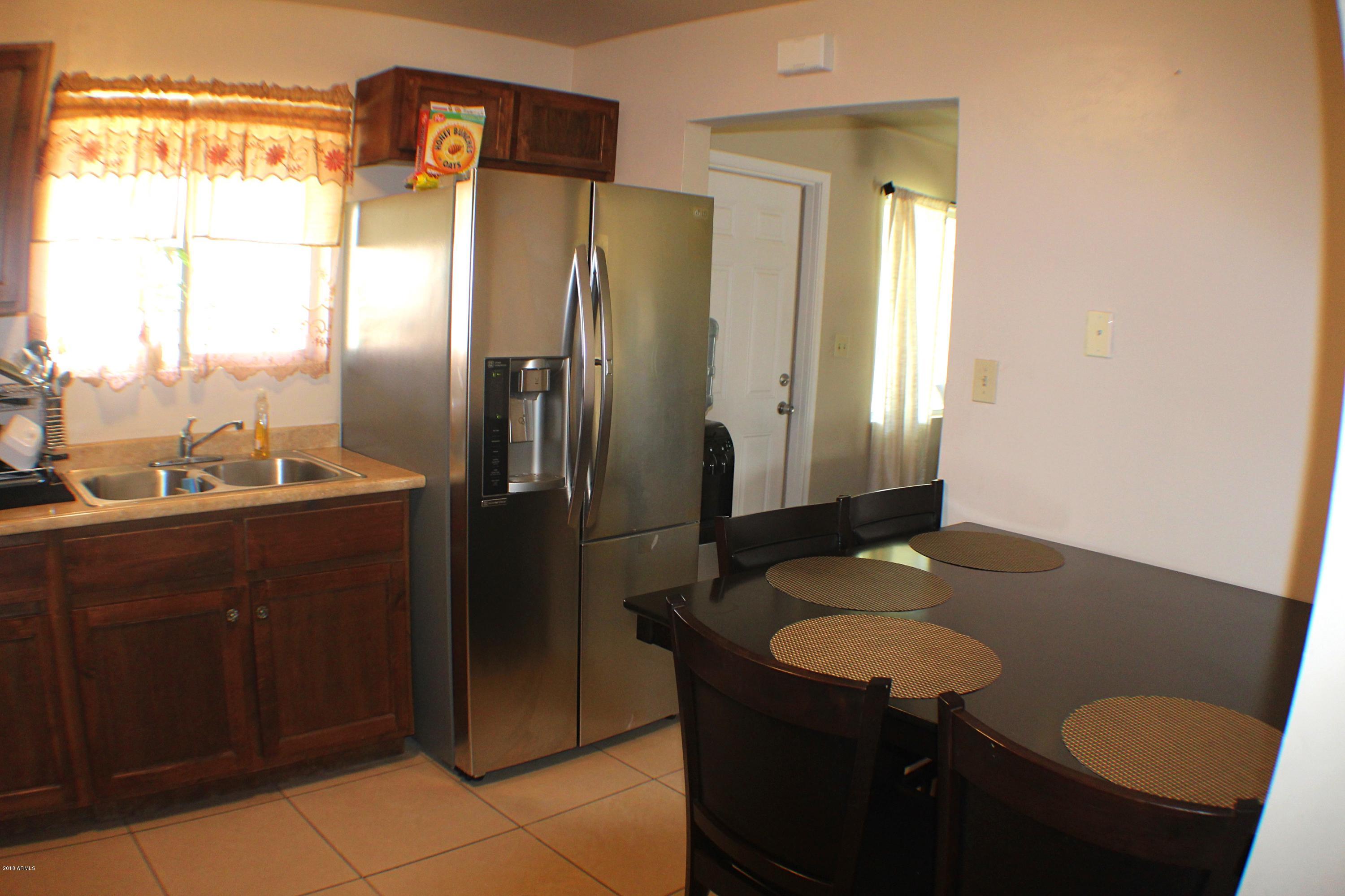3938 West Royal Palm Road Phoenix, AZ 85051 - Photo 8 of 19 Kitchen View 2