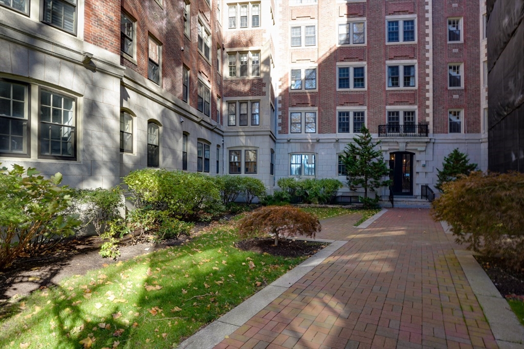983 Memorial Drive, Unit 502 Cambridge, MA 02138 - Photo 32 of 33 a view of a building with potted plants