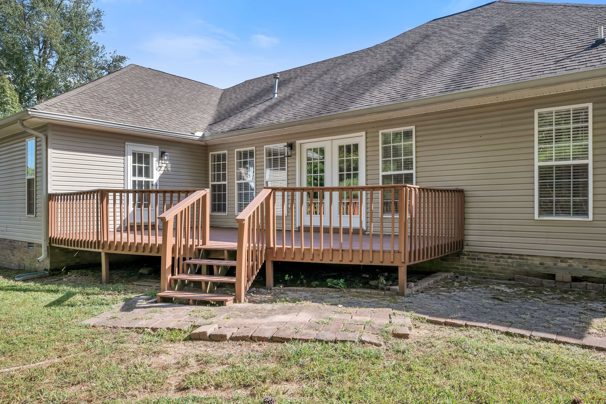 2044 Old Blacktop Road McEwen, TN 37101 - Photo 43 of 45 a view of a house with backyard and deck