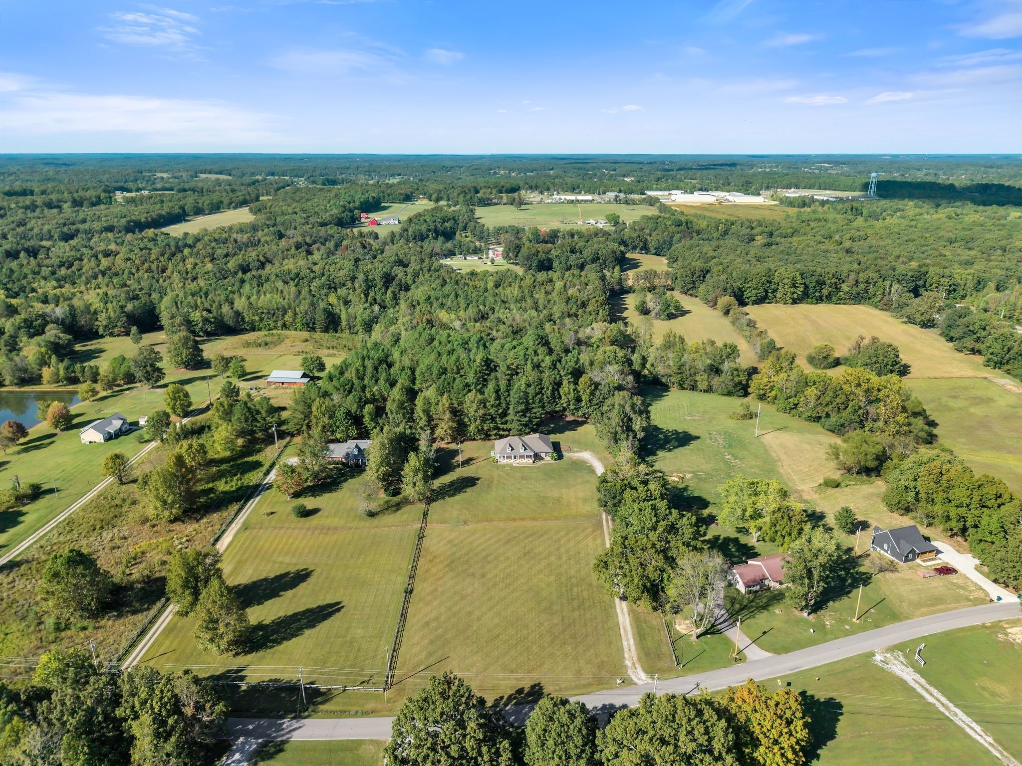 2044 Old Blacktop Road McEwen, TN 37101 - Photo 6 of 45 an aerial view of residential houses with outdoor space and trees