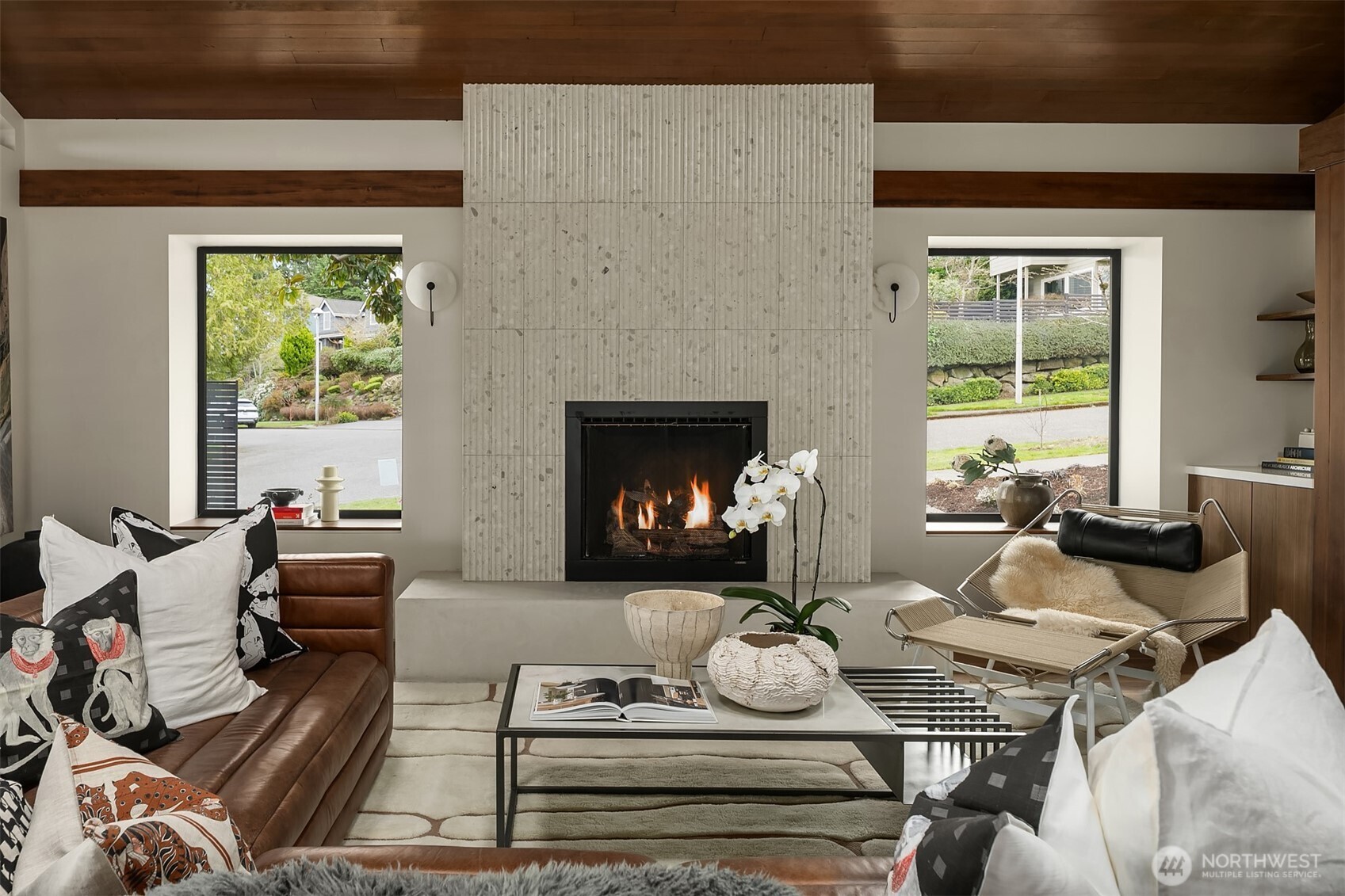 5010 Northeast 52nd Street Seattle, WA 98105 - Photo 15 of 40 a living room with furniture fireplace and a large window