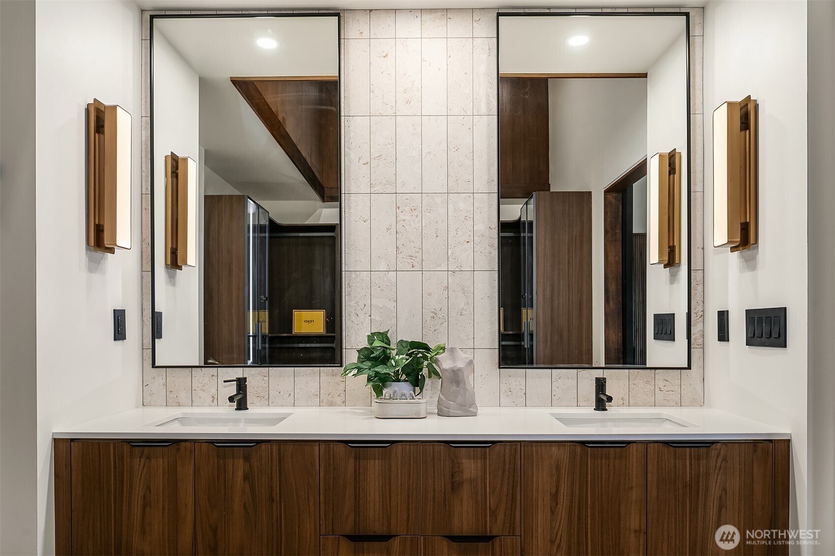 5010 Northeast 52nd Street Seattle, WA 98105 - Photo 20 of 40 a bathroom with a double vanity sink and a mirror