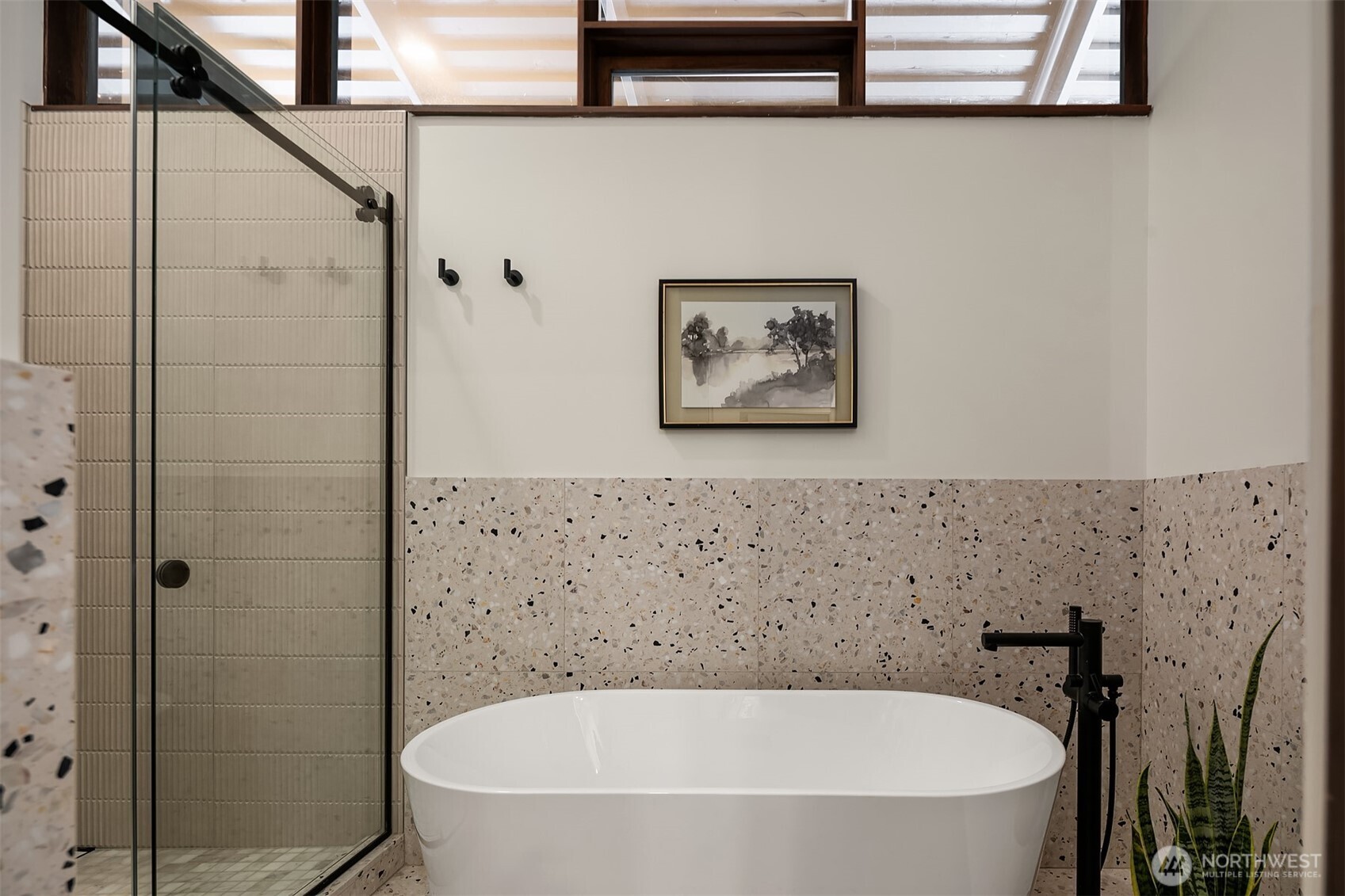 5010 Northeast 52nd Street Seattle, WA 98105 - Photo 21 of 40 a bathroom with a bathtub and shower