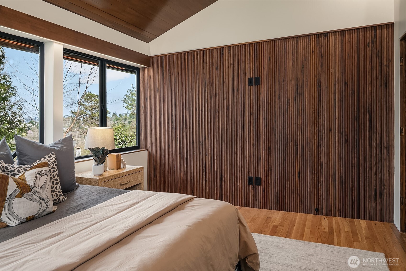5010 Northeast 52nd Street Seattle, WA 98105 - Photo 23 of 40 a bedroom with a bed and large window