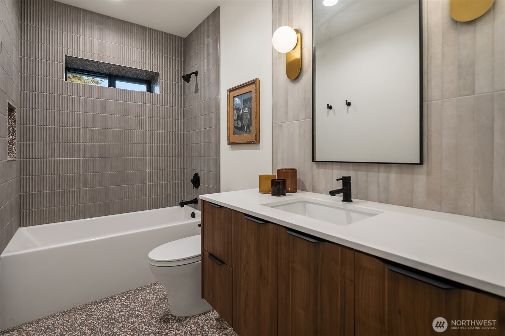 5010 Northeast 52nd Street Seattle, WA 98105 - Photo 24 of 40 a bathroom with a bathtub a sink a toilet and a mirror