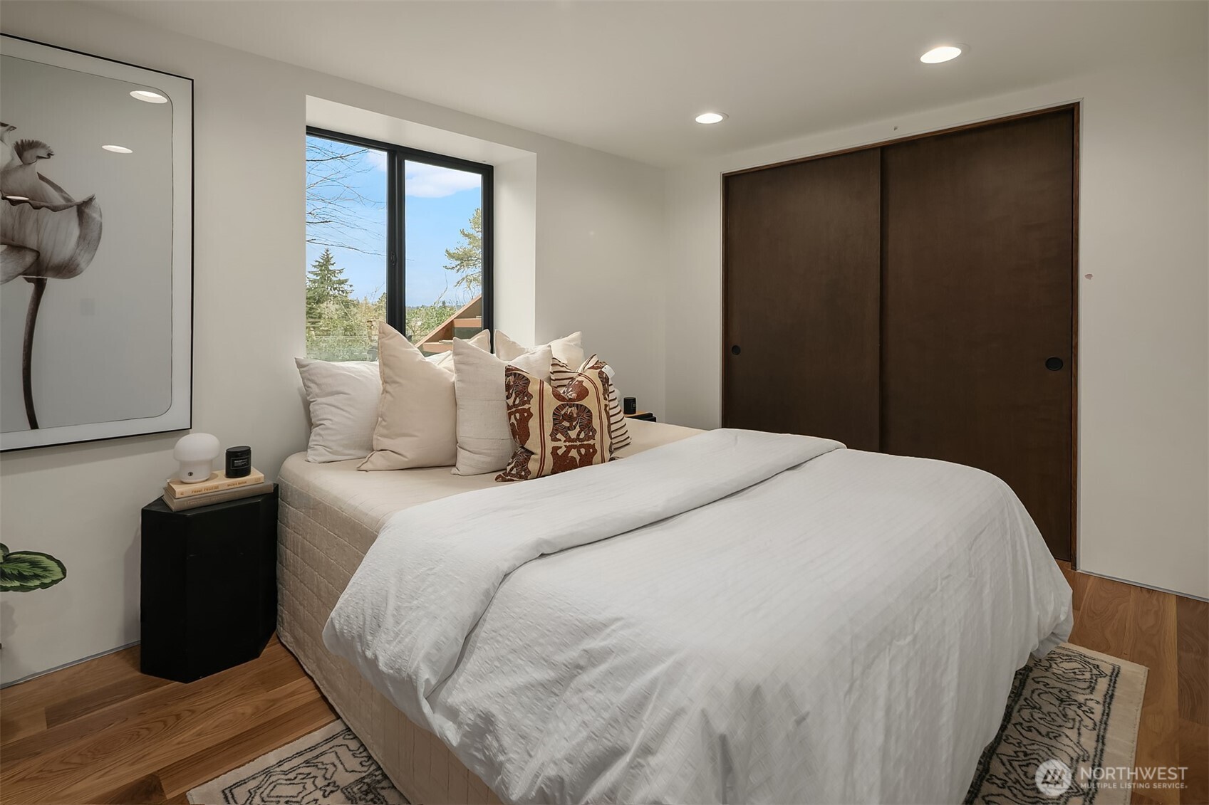 5010 Northeast 52nd Street Seattle, WA 98105 - Photo 25 of 40 a bedroom with a bed and a window