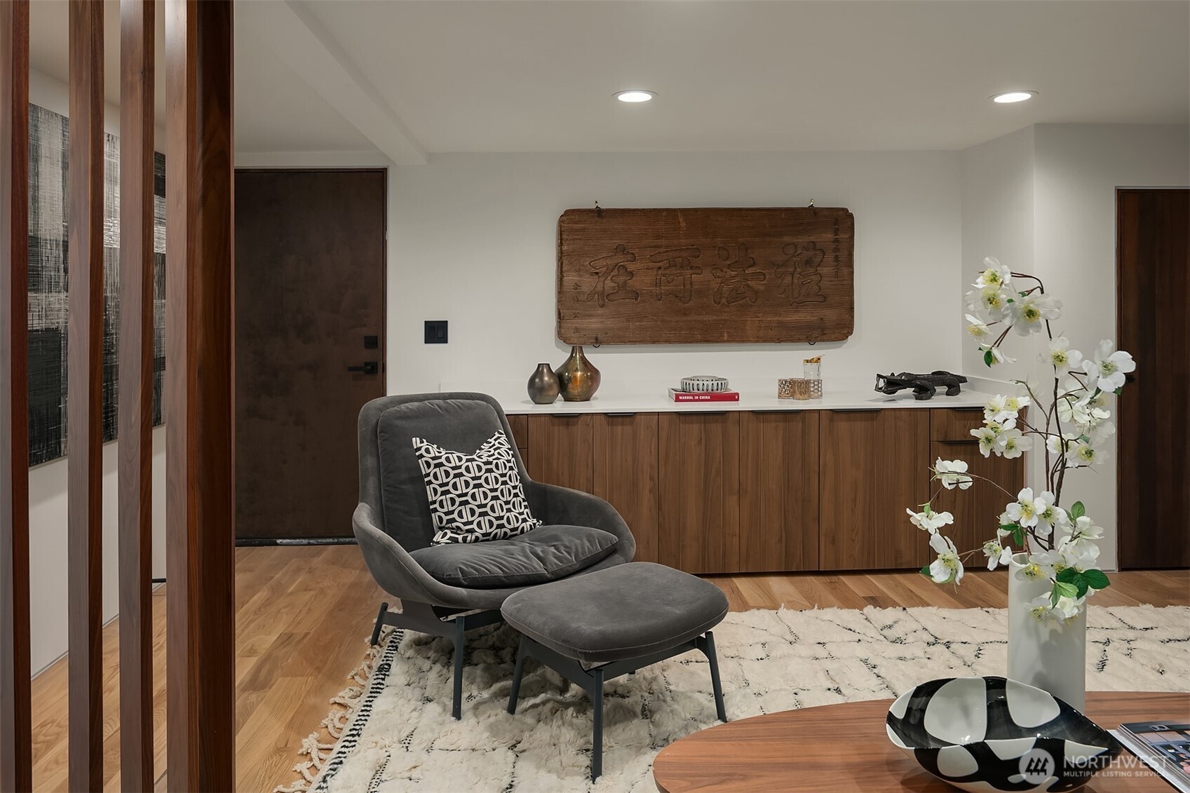 5010 Northeast 52nd Street Seattle, WA 98105 - Photo 26 of 40 a living room with furniture and a flat screen tv