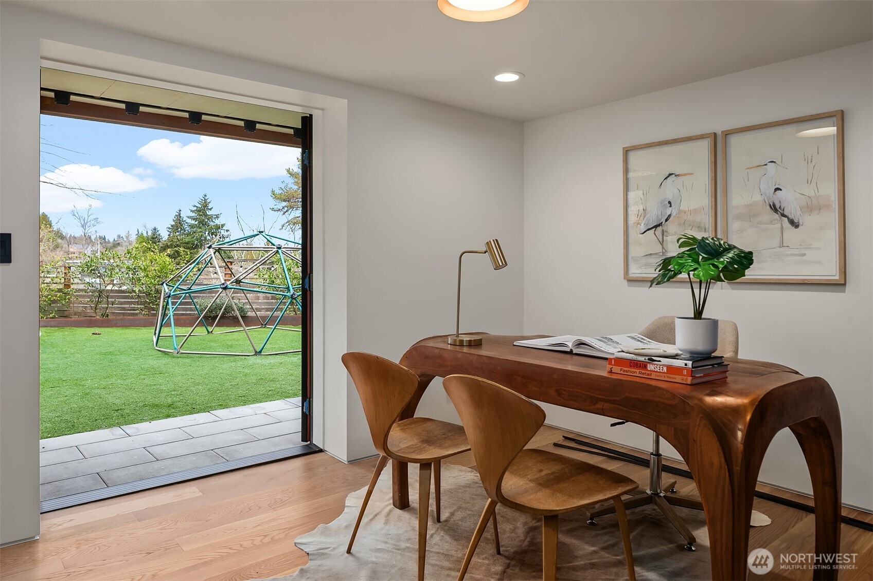5010 Northeast 52nd Street Seattle, WA 98105 - Photo 34 of 40 a room with a table and a chairs