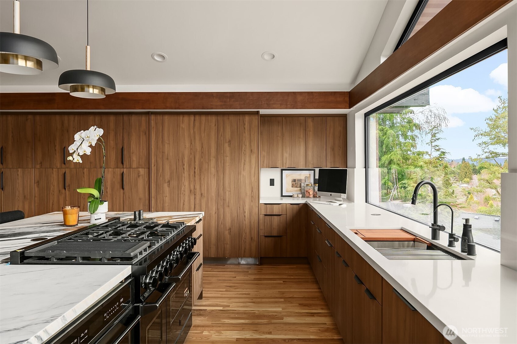 5010 Northeast 52nd Street Seattle, WA 98105 - Photo 9 of 40 a kitchen with a stove and a sink