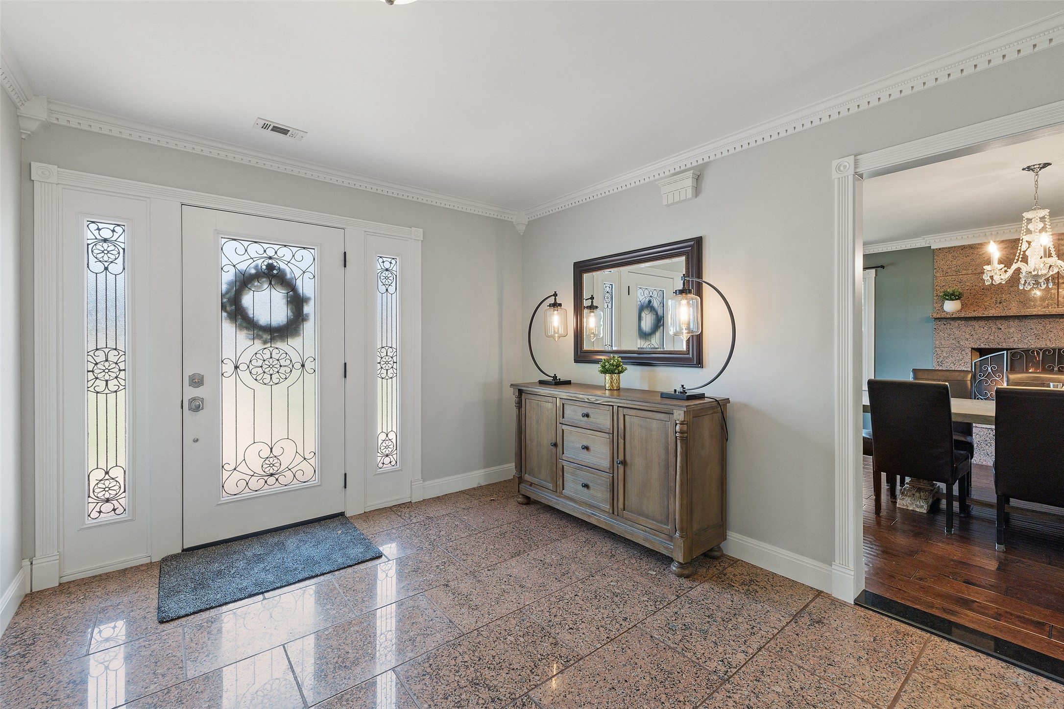 17700 North Rim Drive Leander, TX 78641 - Photo 12 of 38 Entryway with a chandelier, and ornamental molding