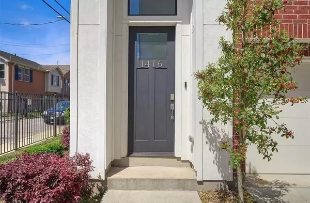 a front view of a house having yard