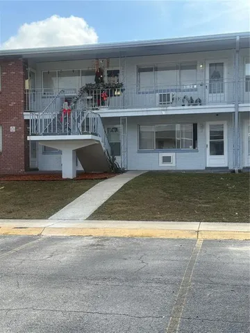 a view of a house with a swimming pool