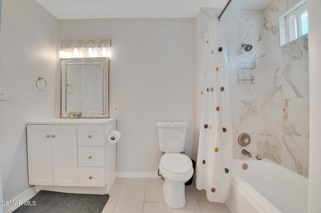 926 Talbert Avenue Simi Valley, CA 93065 - Photo 24 of 41 a bathroom with a sink a toilet and shower