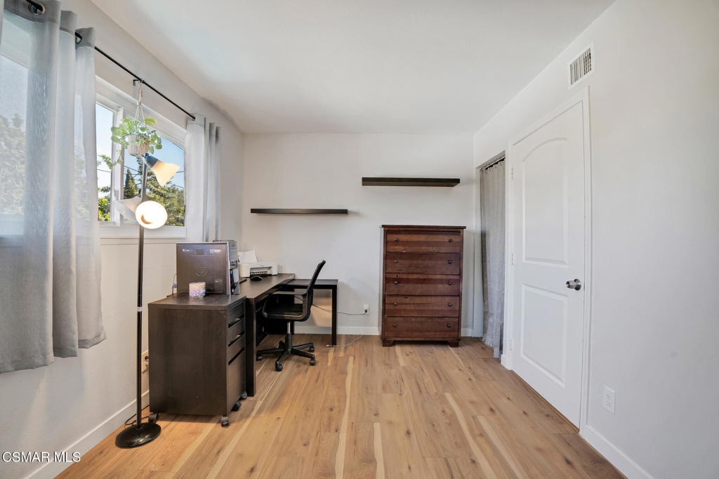 926 Talbert Avenue Simi Valley, CA 93065 - Photo 26 of 41 a view of a workspace with furniture and a window