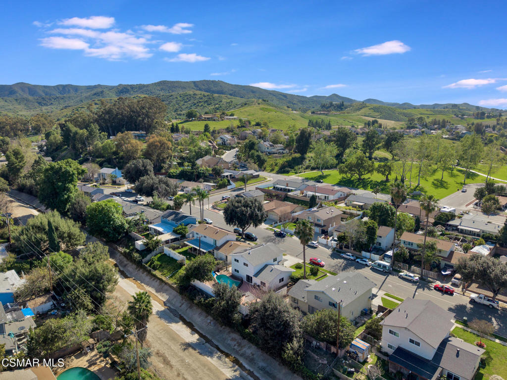 926 Talbert Avenue Simi Valley, CA 93065 - Photo 40 of 41 an aerial view of a city with lots of residential buildings and mountain view in back