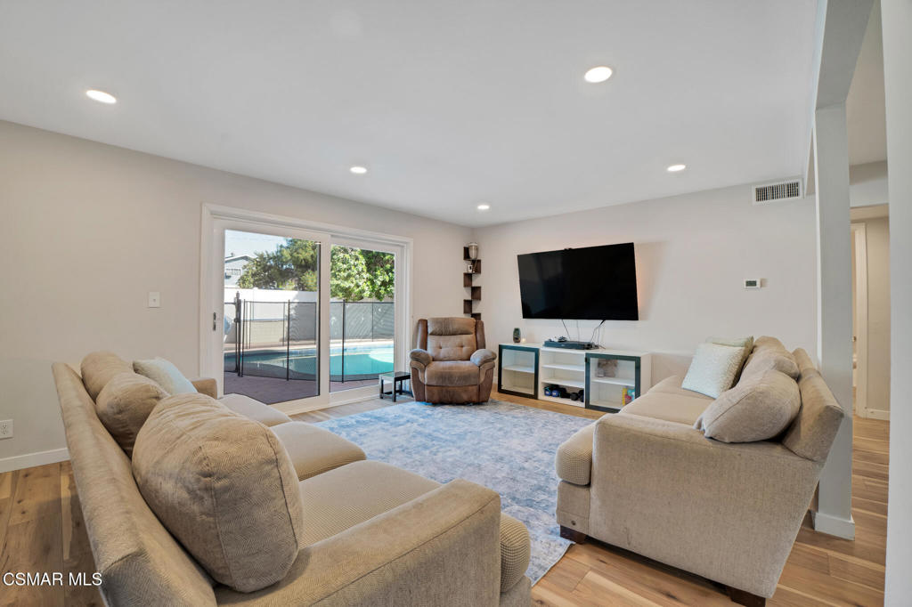 926 Talbert Avenue Simi Valley, CA 93065 - Photo 6 of 41 a living room with furniture and a flat screen tv