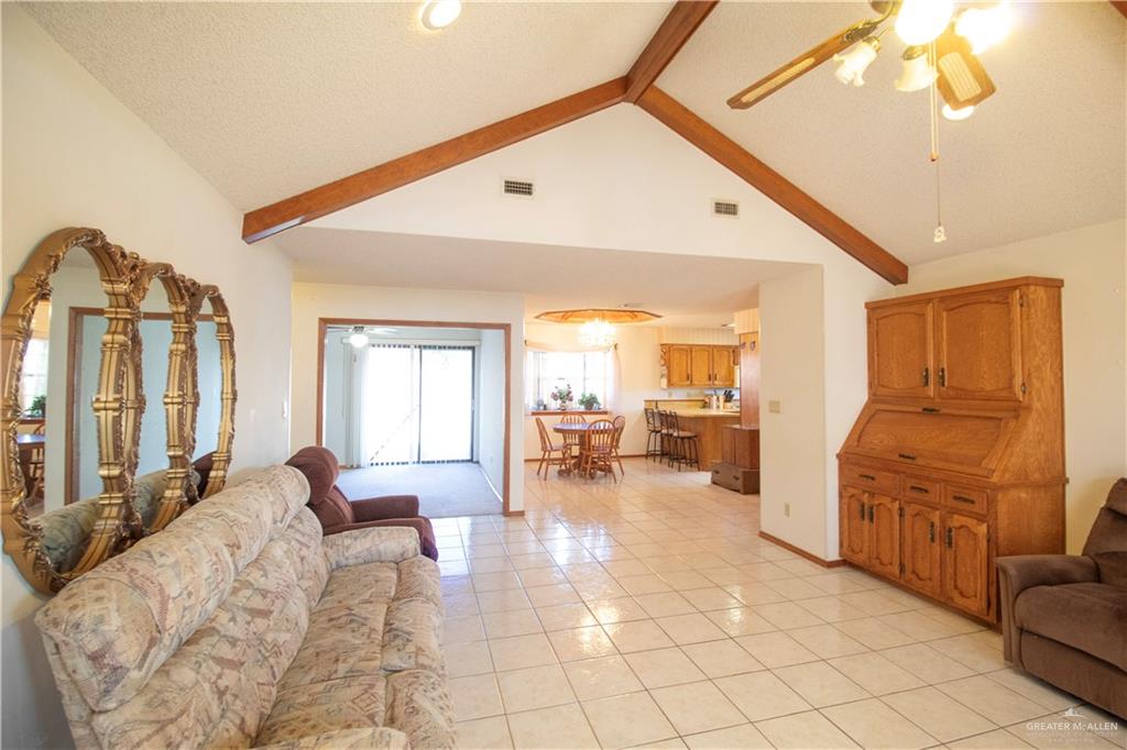 401 Taurus Street Mission, TX 78572 - Photo 10 of 18 a living room with furniture and a large window