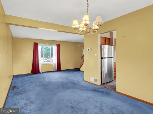a view of a livingroom with a chandelier
