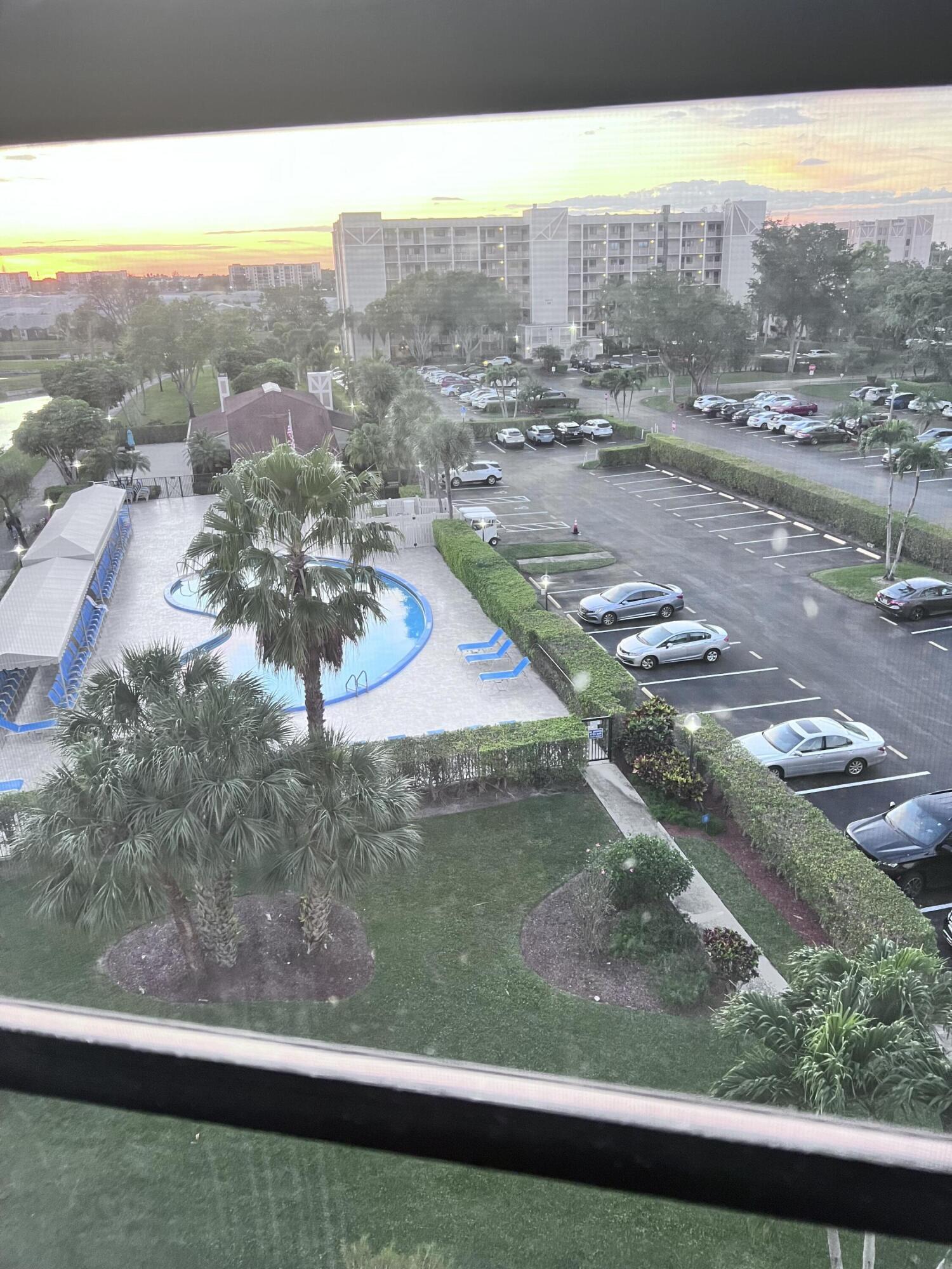 14475 Strathmore Lane, Unit 501 Delray Beach, FL 33446 - Photo 39 of 53 Pool next to building