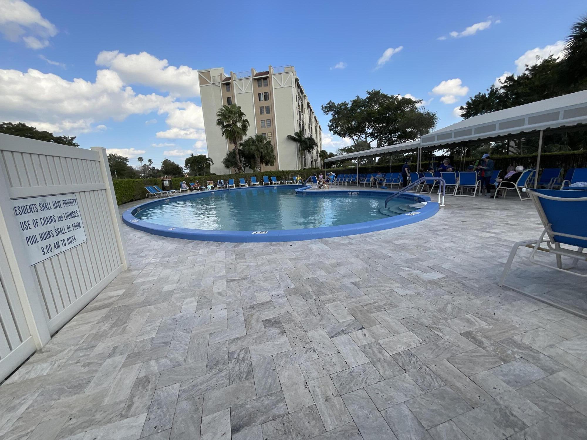 14475 Strathmore Lane, Unit 501 Delray Beach, FL 33446 - Photo 44 of 53 Pool is next to building
