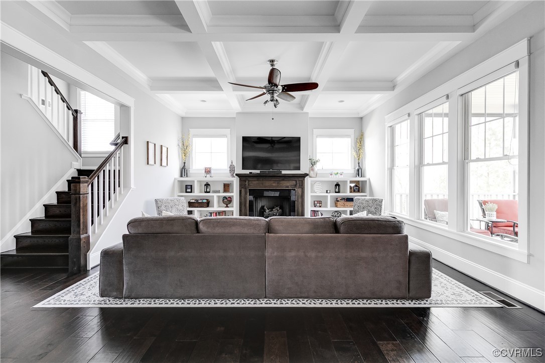 16506 Binley Road Midlothian, VA 23112 - Photo 17 of 49 a living room with fireplace furniture and a flat screen tv