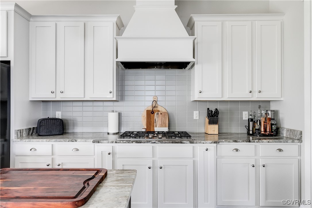 16506 Binley Road Midlothian, VA 23112 - Photo 20 of 49 a kitchen with stainless steel appliances granite countertop white cabinets and a stove