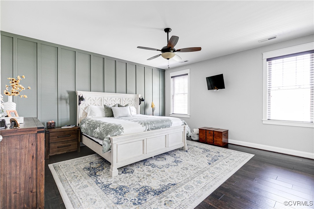 16506 Binley Road Midlothian, VA 23112 - Photo 27 of 49 a bedroom with a large bed and a dresser