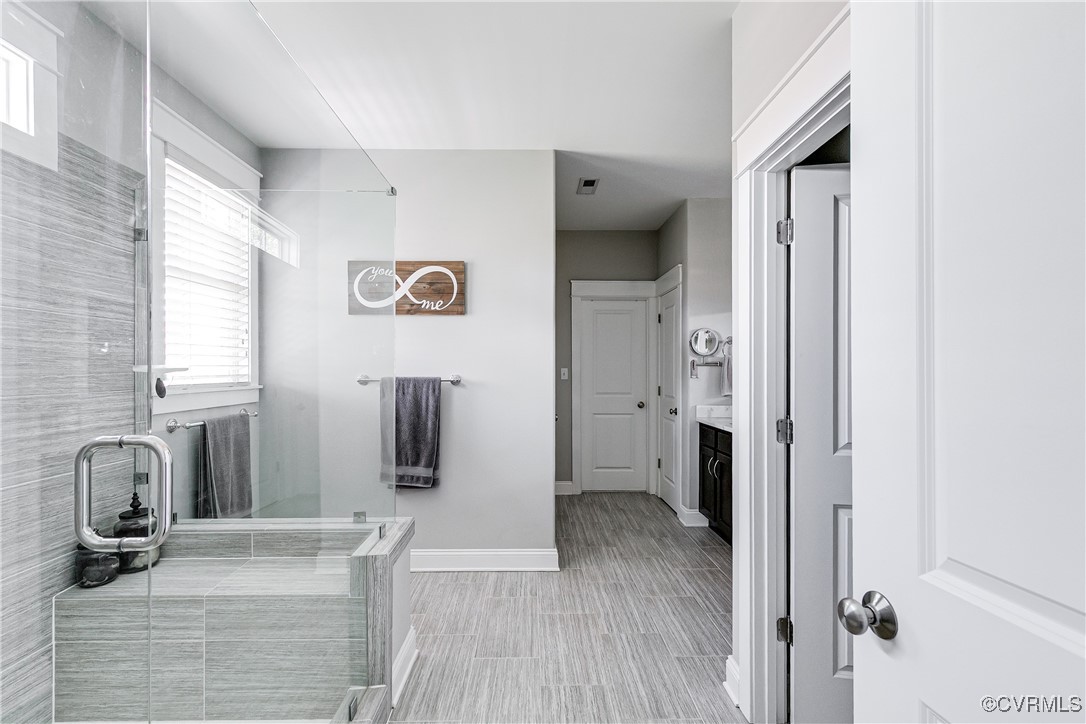 16506 Binley Road Midlothian, VA 23112 - Photo 30 of 49 a view of a hallway with wooden floor and staircase